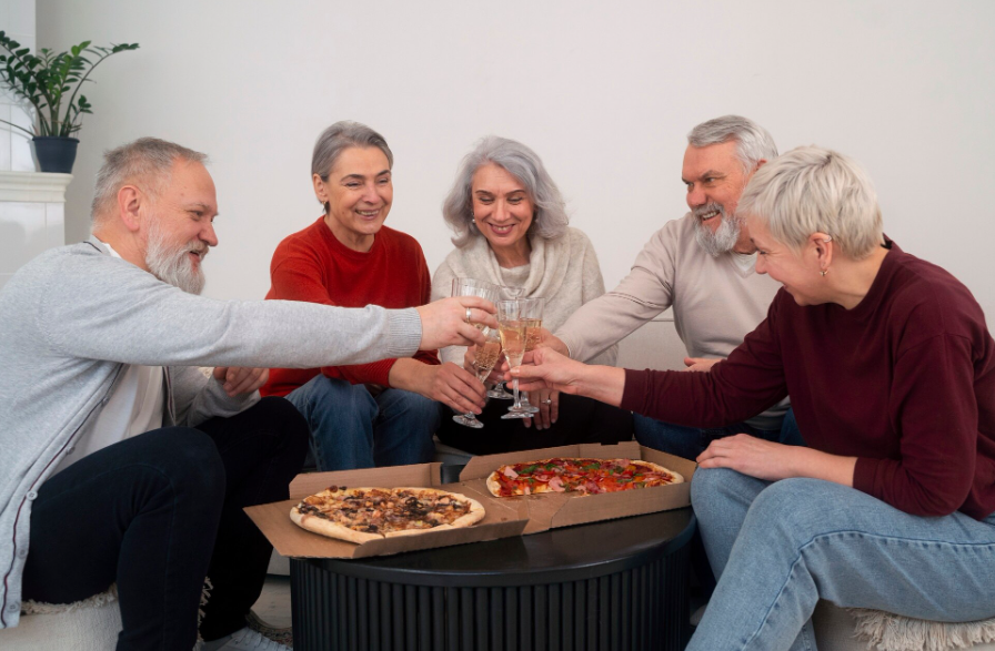 Nurse helping patient in hospital bed